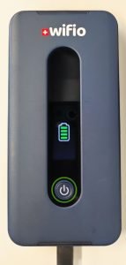 Wifio pocket WiFi being charged with USB Type-C cable – charging guide for Switzerland and global use
